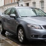 Car Drying Towels beside a freshly washed car on a London street